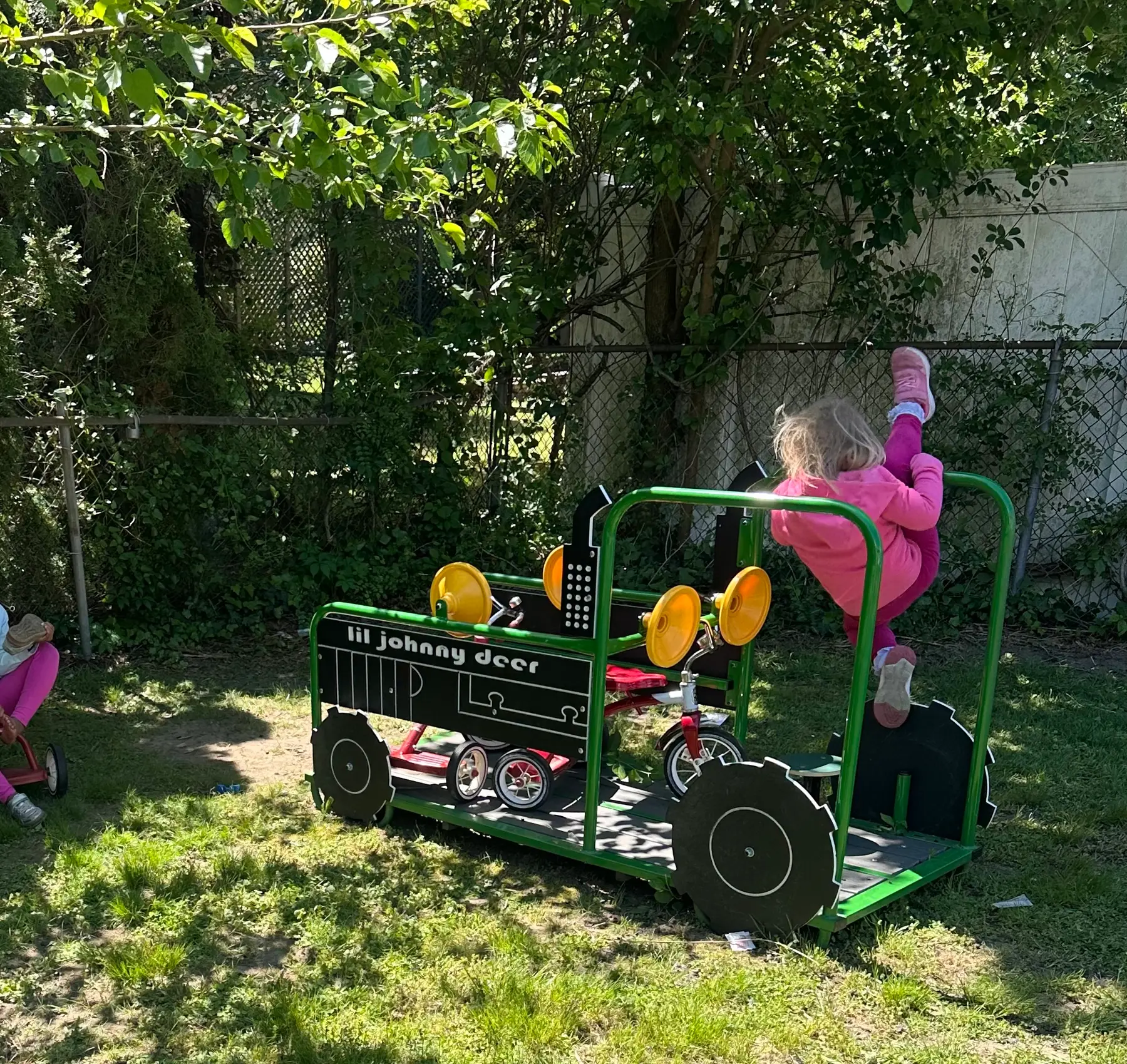 A small group in the outdoor play area
