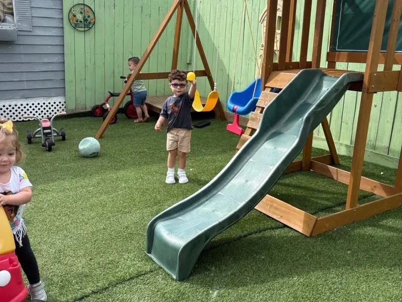 A small group in the outdoor play area