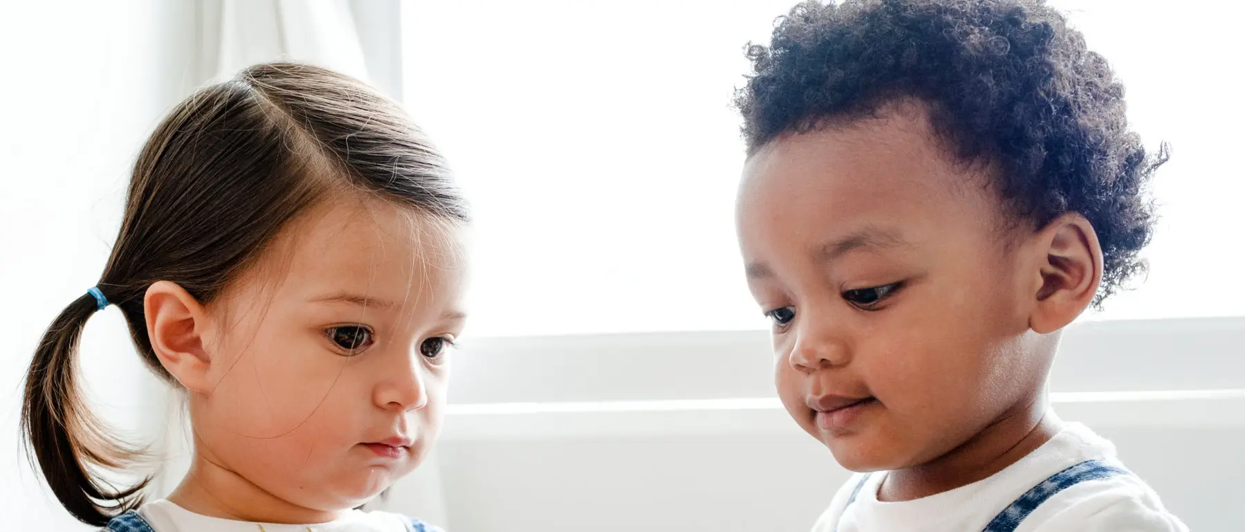 two kids playing together