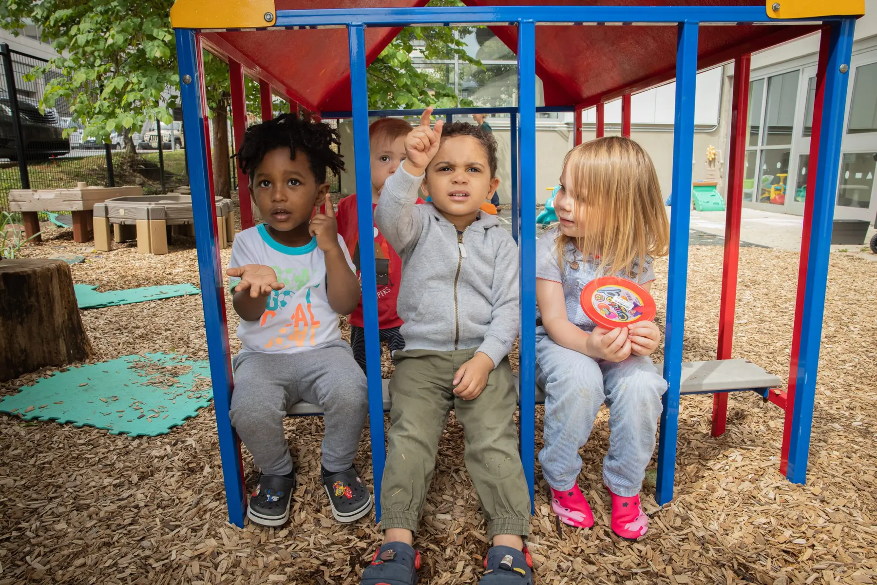 A small group in the outdoor play area