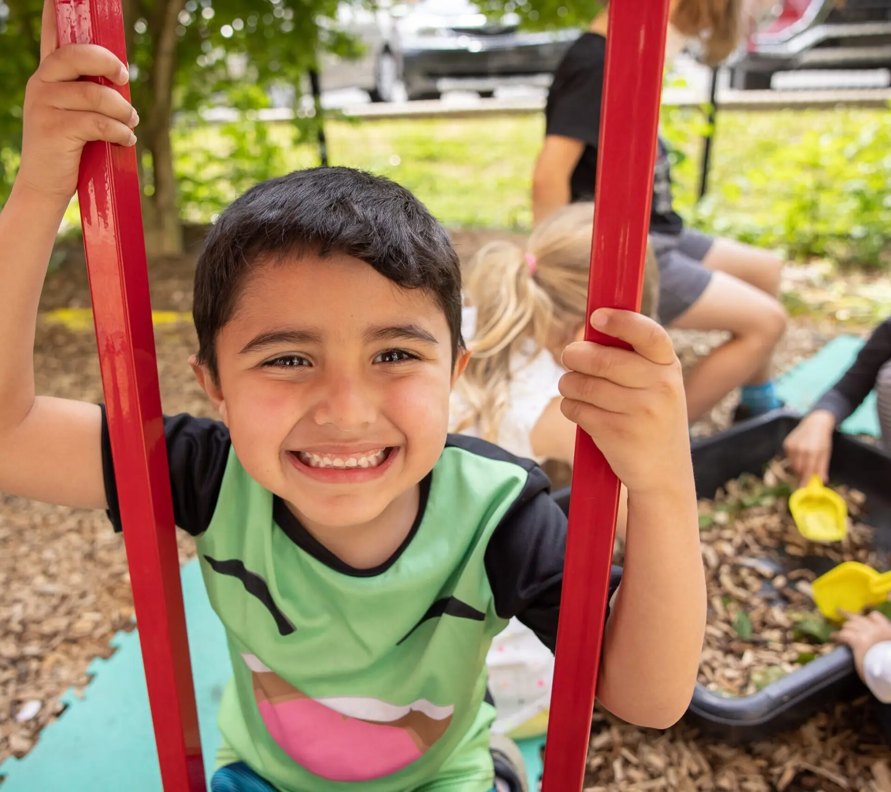 A small group in the outdoor play area
